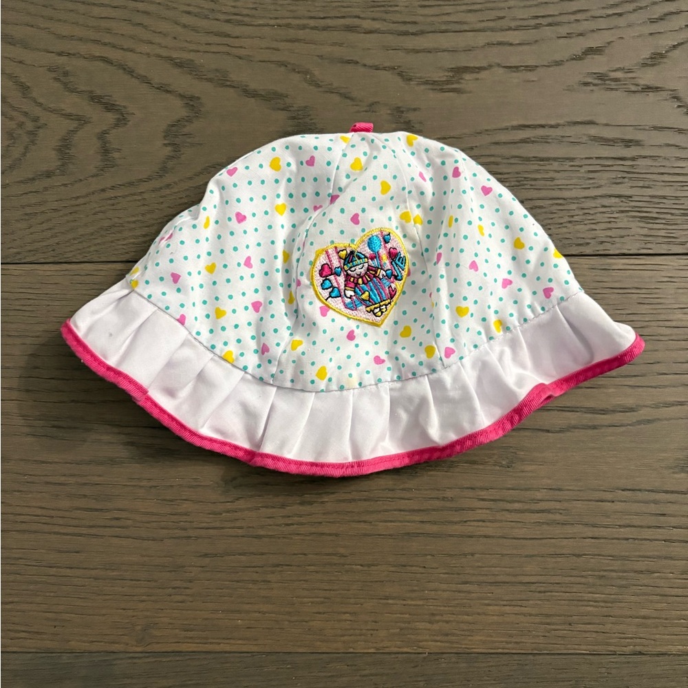Baby girl sun hat 6-12M new with tags. Retail $39USD
